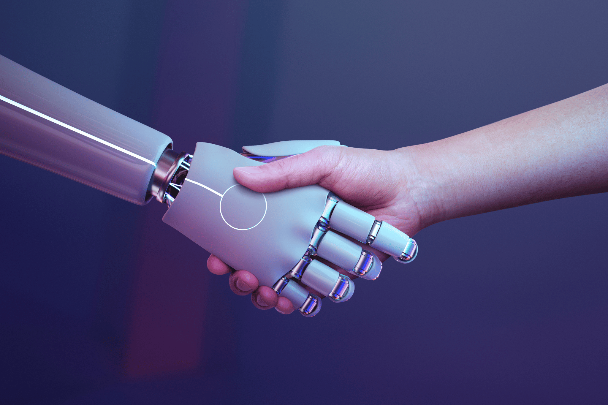 Robot and human shaking hands.